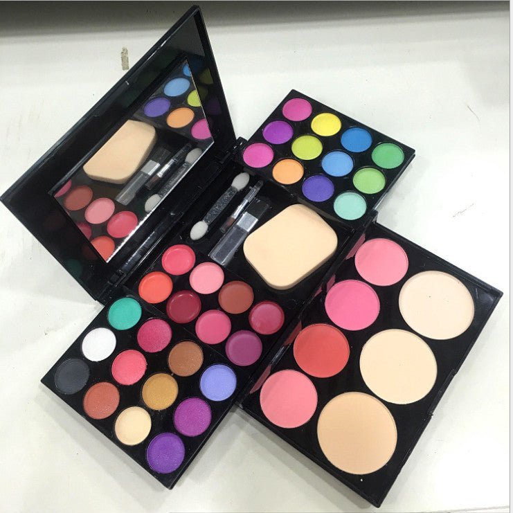 Makeup box make-up set $32.40 Dana Fashion Net weight: 50ml makeup Includes: 24 color eyeshadow, 4 colors blush, 3 powder cakes (2 wet and dry +1 wet), 8 color lipstick, eye shadow stick, small blush brush, lip brush, puff, mirror. Length 14.2cm width 11c