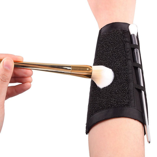 Makeup Brush Cleaning Strap $15.00 Dana Fashion Color: Black makeup Overview: Tie on the arm to quickly clean the brush. Clean makeup brush to extend the service life. Nylon diving cloth, antibacterial, antistatic, moisture wicking. Specification: Materia