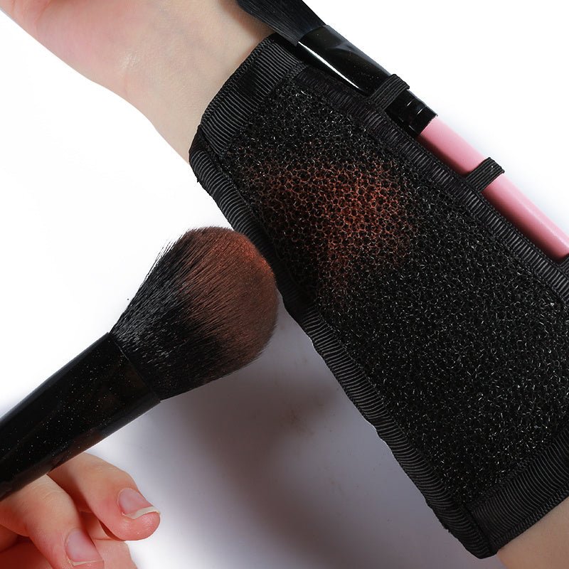 Makeup Brush Cleaning Strap $15.00 Dana Fashion Color: Black makeup Overview: Tie on the arm to quickly clean the brush. Clean makeup brush to extend the service life. Nylon diving cloth, antibacterial, antistatic, moisture wicking. Specification: Materia