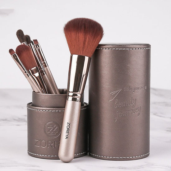 Makeup brush set $27.99 Dana Fashion Color: Brown makeup Bristle material: artificial fiber Brush handle material: aluminum tube Daily makeup brush with fiber bristles. Soft and smooth Traveling out of Guangguang without any trouble is divided into two. C
