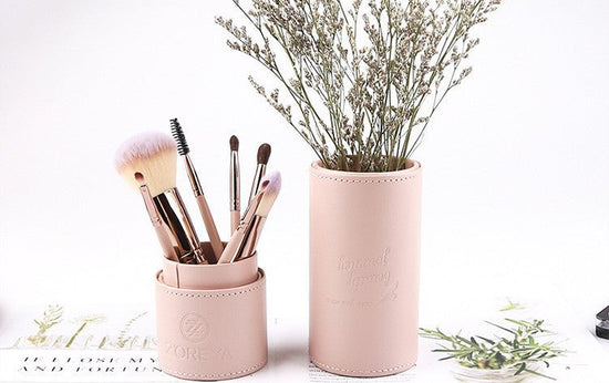Makeup brush set $27.99 Dana Fashion Color: Black makeup Bristle material: artificial fiber Brush handle material: aluminum tube Daily makeup brush with fiber bristles. Soft and smooth Traveling out of Guangguang without any trouble is divided into two. C