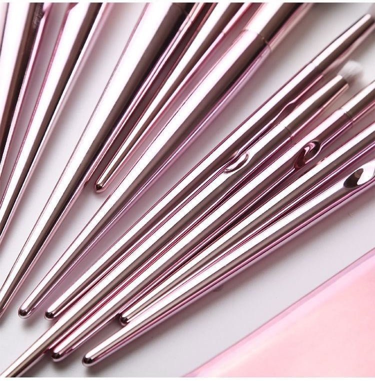 Makeup brush $21.15 Dana Fashion Style: 10pcs makeup Pink clutch bag, soft and breathable, easy to carry, pink PVC rod, high gloss, durable and wear-resistant, with specular highlights. Concave-convex design, more close to the fingertips touch, easy to pi