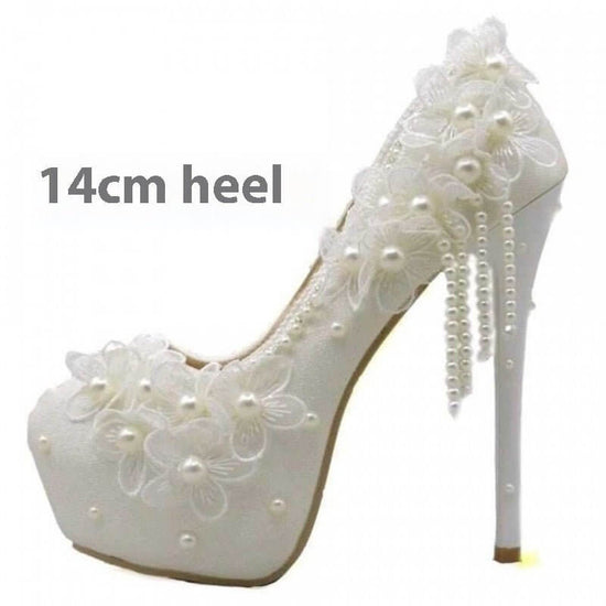 Male Lace High-heeled Shoes Korean Style, Flower Rhinestone Tassel Bride $105.50 Dana Fashion Specifications: 14cm Heel White Size: 34 Women's shoes Product information: Pattern: Flowers Color: 14cm heel White, 11cm heel White, 8cm heel White, 5cm heel Wh