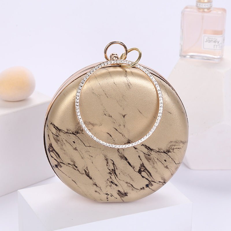 Marble Pattern Portable Cosmetic Bag $45.70 Dana Fashion Color: Gold Women's Bags Product information: Material: PU leather Applicable scene: cosmetic bag, party, storage bag, storage bag Fabric texture: PU Lining texture: PU Bag trend style: round Bag in
