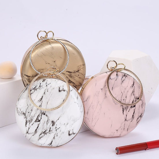Marble Pattern Portable Cosmetic Bag $45.70 Dana Fashion Color: White Women's Bags Product information: Material: PU leather Applicable scene: cosmetic bag, party, storage bag, storage bag Fabric texture: PU Lining texture: PU Bag trend style: round Bag i