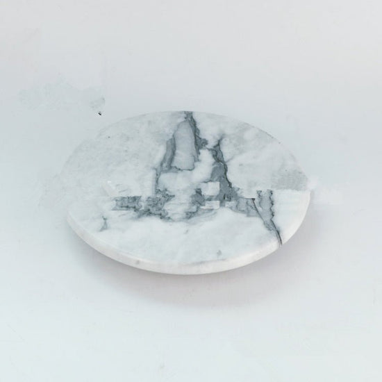 Marble Rotatable Cake Pan $89.64 Dana Fashion Color: Grey Dana's Kitchen Brand: None Item No.: LS-215 Product Category: Disk Material: Marble Whether to import: No Applicable people: adults Pattern: various Style: Western Shape: round Microwave: Not avail
