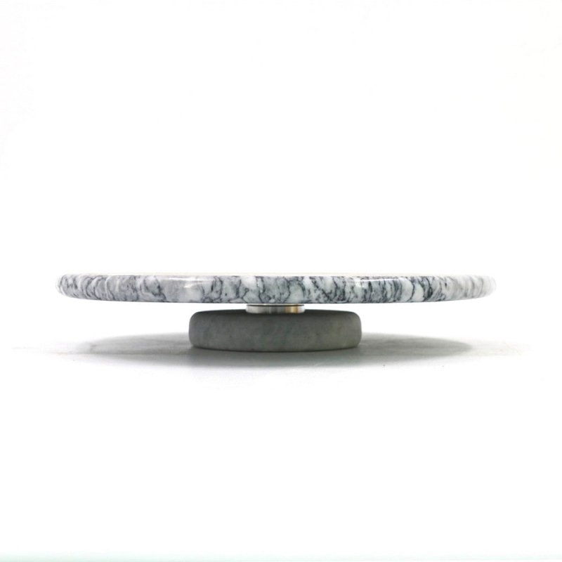 Marble Rotatable Cake Pan $89.64 Dana Fashion Color: Grey Dana's Kitchen Brand: None Item No.: LS-215 Product Category: Disk Material: Marble Whether to import: No Applicable people: adults Pattern: various Style: Western Shape: round Microwave: Not avail