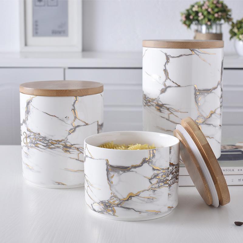 Marbled ceramic wooden lid airtight jar $131.76 Dana Fashion Size: 3pcs a set Dana's Kitchen [Name]: Sealed storage container [Style]: Nordic simplicity [Material]: High temperature ceramic [Selection]: Large, medium and small are available [Size]: Large