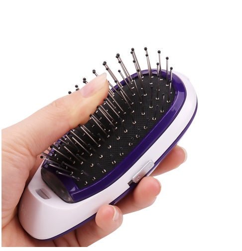 Massage comb $19.00 Dana Fashion Color: Pink 2 Beauty Tools Type: Comb Model: ion electric Hair brush material: metal Size: ion electric brush Product Name: Electric Ion Modeling Hair color: pink, black, purple Tips for using: 1. Before combing hair with