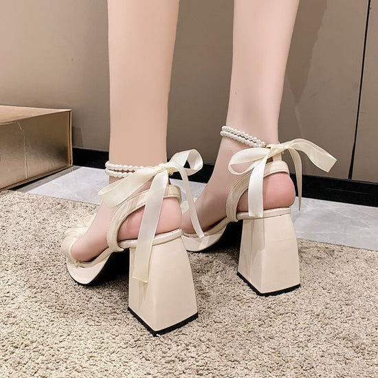 Medium Chunky Heel Crystal French Style Fairy Pearl Roman Sandals $39.50 Dana Fashion Color: Beige Size: 35 Women's shoes Product information: Lining material: no lining Toe holder shape: square head Color: beige 8cm], black upgraded version [8cm]] Shoe U