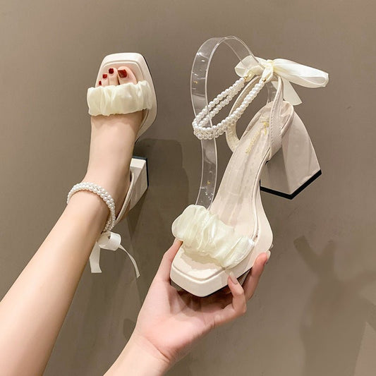 Medium Chunky Heel Crystal French Style Fairy Pearl Roman Sandals $39.50 Dana Fashion Color: Beige Size: 35 Women's shoes Product information: Lining material: no lining Toe holder shape: square head Color: beige 8cm], black upgraded version [8cm]] Shoe U
