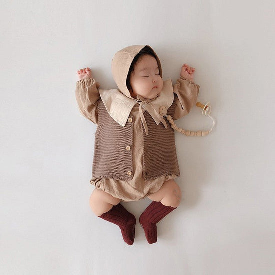 Men's And Women's Solid Color Knitted Base Vest Cardigan $24.89 Dana Fashion Color: Brown Child size: 100cm Baby Clothing Product Information: Yarn thickness: fine wool Thickness: General Sleeve length: long sleeve Closed style: single-breasted Pattern: p