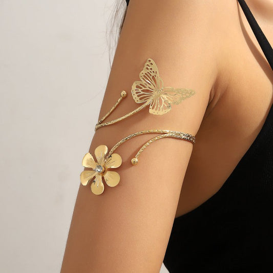 Metal Texture Three-dimensional Flowers Exquisite Hollow Design Butterfly Arm Decorations $10.77 Dana Fashion Color: Gold Women's Accessories Product information: Treatment Process: Electroplating Color: Gold Style: Women's Function: Decoration Material: