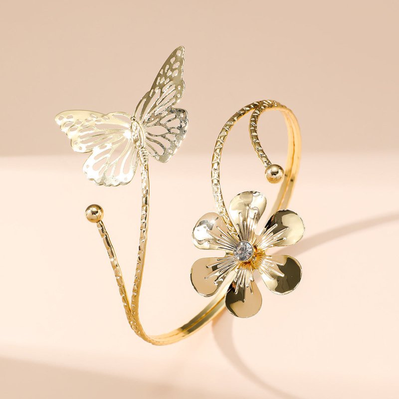 Metal Texture Three-dimensional Flowers Exquisite Hollow Design Butterfly Arm Decorations $10.77 Dana Fashion Color: Gold Women's Accessories Product information: Treatment Process: Electroplating Color: Gold Style: Women's Function: Decoration Material: