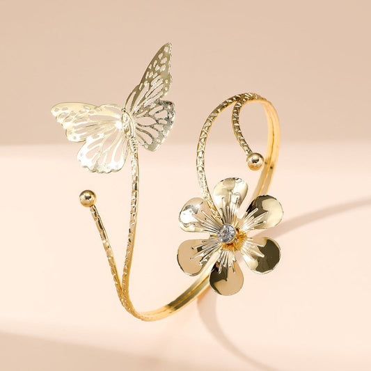 Metal Texture Three-dimensional Flowers Exquisite Hollow Design Butterfly Arm Decorations $10.77 Dana Fashion Color: Gold Women's Accessories Product information: Treatment Process: Electroplating Color: Gold Style: Women's Function: Decoration Material: