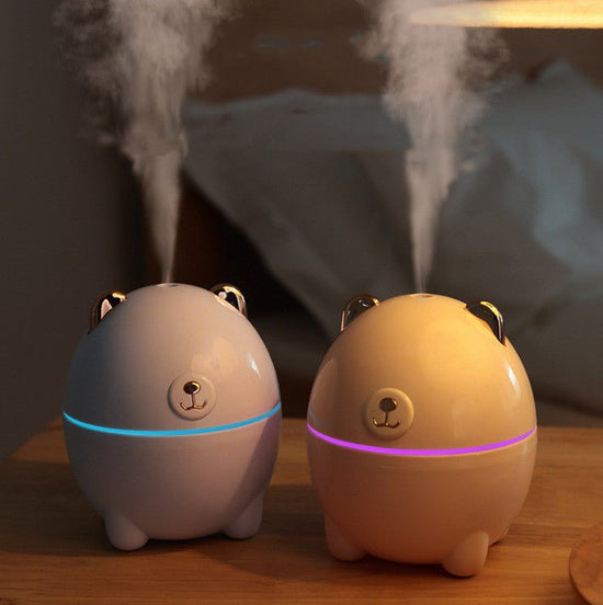 Mini bear humidifier spray aroma lamp $19.00 Dana Fashion Color: Blue Beauty Tools Product name: Bear Humidifier Applicable area: 10-20 square meters Rated power: 2W ± 0.5W Rated voltage: 5V/500mA Weight: 105g. Power supply mode: USB Fog output: 30-40ml/h