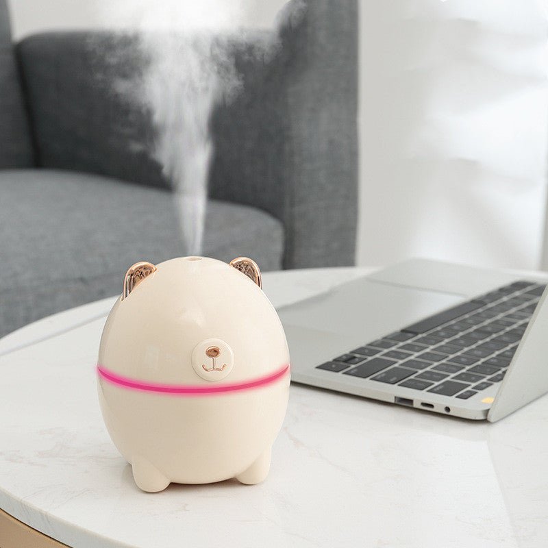 Mini bear humidifier spray aroma lamp $19.00 Dana Fashion Color: Blue Beauty Tools Product name: Bear Humidifier Applicable area: 10-20 square meters Rated power: 2W ± 0.5W Rated voltage: 5V/500mA Weight: 105g. Power supply mode: USB Fog output: 30-40ml/h