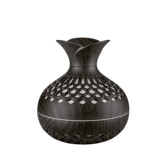 Mini Desktop Creativity Three-leaf Flower Humidifier $32.50 Dana Fashion Color: Deep Wood Grain Style Electrical outlet: USB Beauty Tools Product information: Power type: USB Noise: below 36dB Color: light wood grain, deep wood grain Appearance: Vase Oper