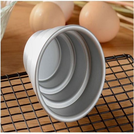 Mini Multi-Layer Cake Tray $32.64 Dana Fashion Color: Silver 2pcs style: Three floors Dana's Kitchen Integrated two-layer cake mold: Size: 7cm in diameter * 7.8cm in height One three-layer cake mold: Size: 7cm in diameter * 8cm in height Four-layer cake m
