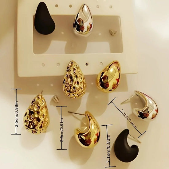 Minimalistic Water Drops Hammered Earrings Suit Fashion Geometry Pattern Earrings $12.94 Dana Fashion Color: Color Women's Accessories Product information: Treatment Process: Electroplating Color: Color Applicable population: Female Material: CCB Shape: d