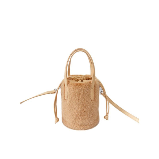 Mink-like Bucket Vintage Plush Hand Bag $45.52 Dana Fashion Color: Light Brown Size: 14X28X14cm Women's Bags Product information: Color: black, light brown, caramel, pink, apricot, White Applicable Gender: Female Hardness: medium Material: mink-shaped Sui