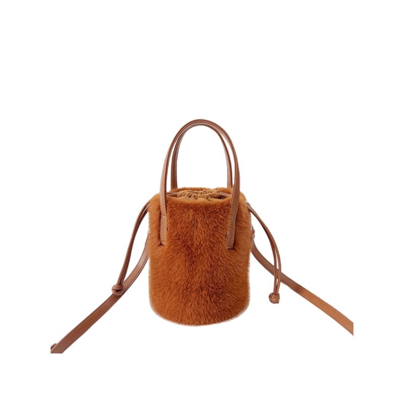 Mink-like Bucket Vintage Plush Hand Bag $45.52 Dana Fashion Color: Caramel Color Size: 14X28X14cm Women's Bags Product information: Color: black, light brown, caramel, pink, apricot, White Applicable Gender: Female Hardness: medium Material: mink-shaped S
