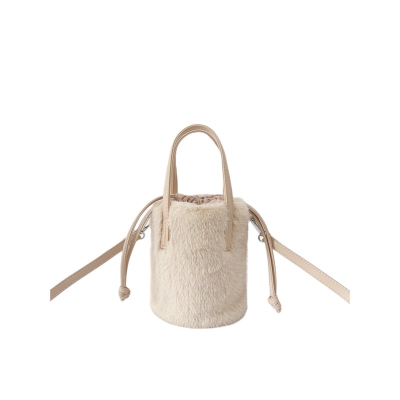 Mink-like Bucket Vintage Plush Hand Bag $45.52 Dana Fashion Color: Apricot Size: 14X28X14cm Women's Bags Product information: Color: black, light brown, caramel, pink, apricot, White Applicable Gender: Female Hardness: medium Material: mink-shaped Suitcas