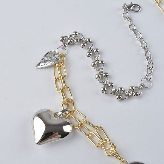 Multi-Element Chain Stitching Punk Vintage Distressed Love Pendant Belt $18.00 Dana Fashion Color: Heart Tassel Women's Accessories Product information: Color: heart-shaped tassel Applicable Gender: Female Applicable age: Adult Material: Metal Style: Swee