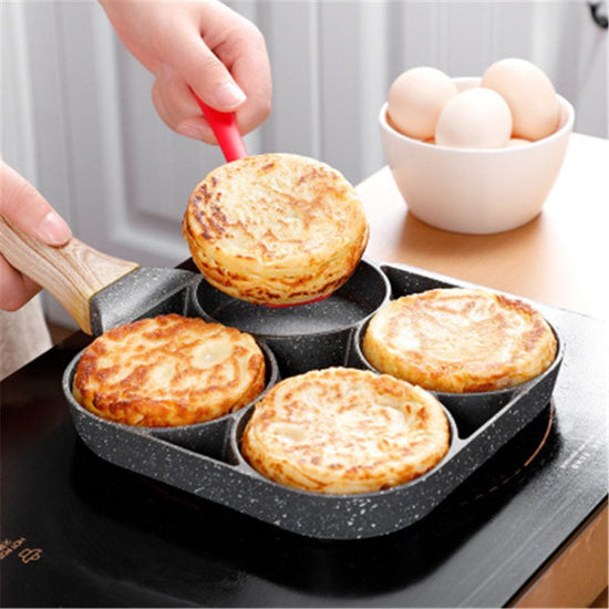 Multi Functional 4 Hole Frying Pan Non Stick Breakfast Burger Egg Pancake Maker Medical Stone Four Hole Omelet Pan $46.50 Dana Fashion Color: Four hole pot style: With brush Dana's Kitchen Overview: 1. Easy to Clean: The high-performance egg frying pan is