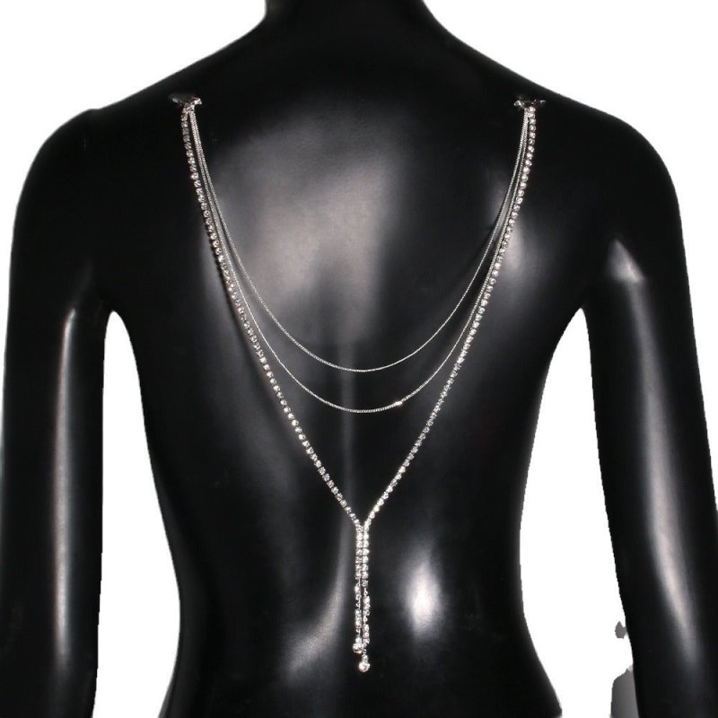 Multi-layer Back Chain Bridal Wedding Dress Accessories Rhinestone Tassel $21.00 Dana Fashion Color: Gold Women's Accessories Product information: Type: body chains Color: gold, silver Material: Rhinestone Style: Women's Shape: Geometry Style: European an