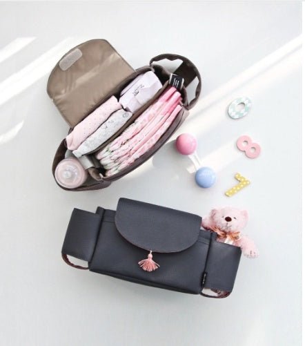 Multifunction Baby Stroller Bag Organizer Maternity Nappy Bag Stroller Accessories Cup wheelchair bag $60.18 Dana Fashion Color: 3colors set1 Baby & Mother Overview: The trolley storage bag can hold baby's diapers, feeding bottles, wallet and mobile phone
