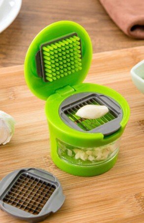 Multifunction Hand Garlic Juicer Garlic Crusher Grinder Slicer Cutter Chopper Vegetable Tools Kitchen Gadgets $29.50 Dana Fashion default: default Dana's Kitchen Brand new and high quality Fast & Easy to Slice, Mince and Store. Storage garlic in clear con