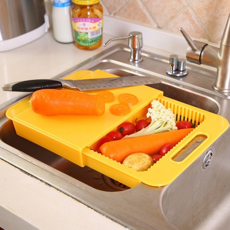 Multifunction Kitchen Chopping Blocks Sinks Drain Basket Cutting Board Vegetable Meat Tools Kitchen Accessories Chopping Board $29.50 Dana Fashion Color: Blue Dana's Kitchen Specifications: Size: about 36x23x4cm Material: PP + TPE handle design