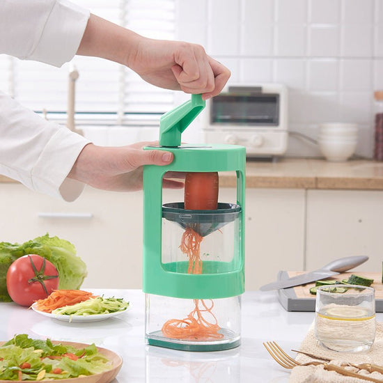 Multifunctional Radish And Cucumber Shredder Vegetable Grater Practical Vegetable Shredder Kitchen Gadgets $38.63 Dana Fashion Color: Photo Color Dana's Kitchen Overview: The unique rotating cutting design enables the grater to cut ingredients faster, rot