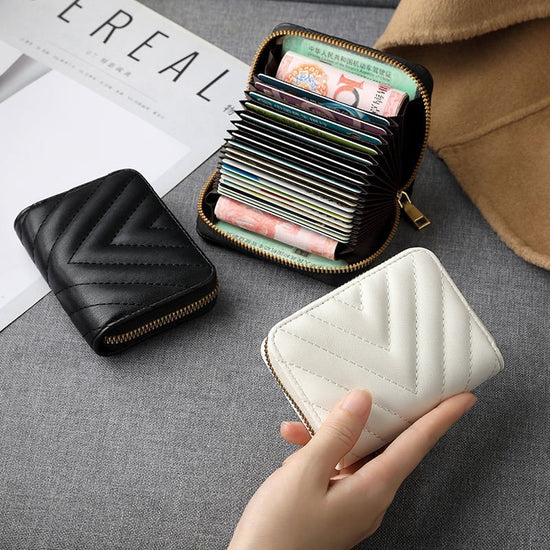 Multiple Card Slots Wallet Niche Card Holder Female $15.00 Dana Fashion Color: Black Women's Bags Product information: Lining texture: pu Applicable scenarios: Daily matching Color: Black [11 card position], white【 11 card position], Black [18 card Positi