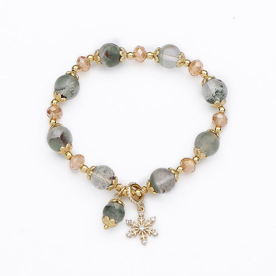 Natural Chorite Crystals Crystal Bracelet Female Snowflake Pendant $25.00 Dana Fashion Color: Green Phantom Quartz Bracelet Women's Accessories Product information: Color: 3A green Phantom quartz bracelet Style: Women's Material: Crystal Shape: Wave Size: