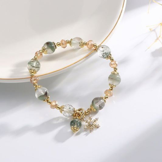 Natural Chorite Crystals Crystal Bracelet Female Snowflake Pendant $25.00 Dana Fashion Color: Green Phantom Quartz Bracelet Women's Accessories Product information: Color: 3A green Phantom quartz bracelet Style: Women's Material: Crystal Shape: Wave Size: