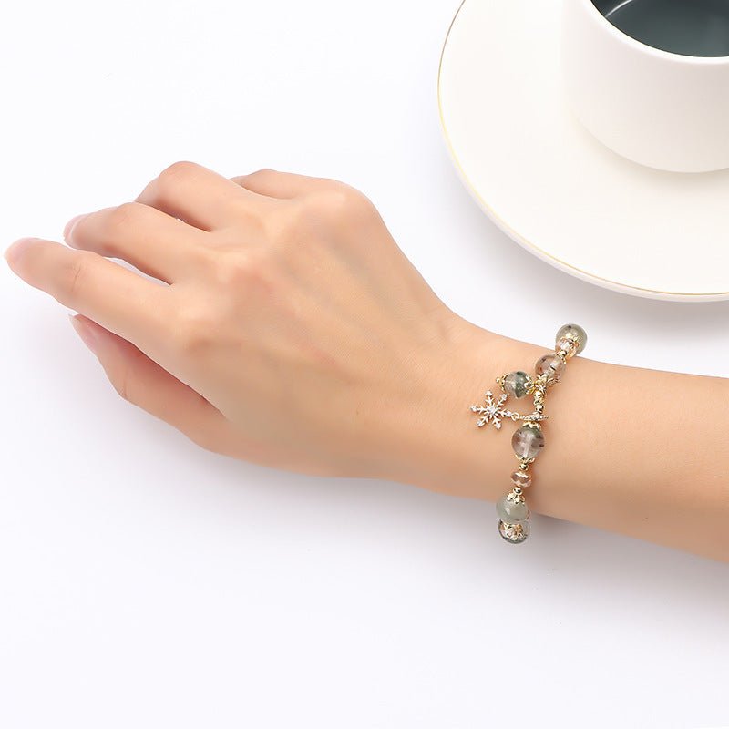 Natural Chorite Crystals Crystal Bracelet Female Snowflake Pendant $25.00 Dana Fashion Color: Green Phantom Quartz Bracelet Women's Accessories Product information: Color: 3A green Phantom quartz bracelet Style: Women's Material: Crystal Shape: Wave Size: