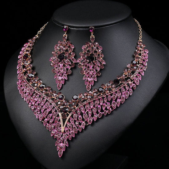Necklace And Earrings Suite High Profile Retro Delicate $43.52 Dana Fashion Color: Purple Women's Accessories Product information: Pattern: plants and flowers Color: purple Pendant material: Alloy Style: Women's Chain style: Regular chain Material: Alloy