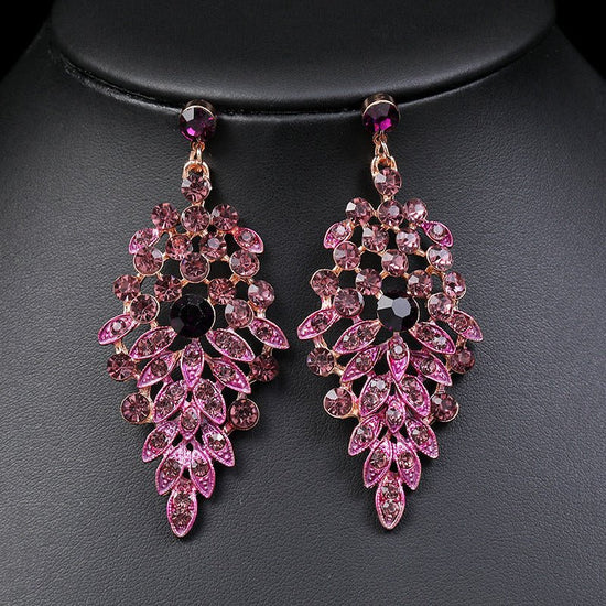 Necklace And Earrings Suite High Profile Retro Delicate $43.52 Dana Fashion Color: Purple Women's Accessories Product information: Pattern: plants and flowers Color: purple Pendant material: Alloy Style: Women's Chain style: Regular chain Material: Alloy