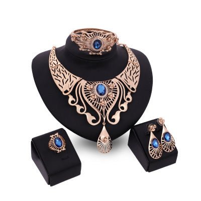 Necklace, earrings, bracelet, ring set $39.11 Dana Fashion Color: Blue Women's Accessories Style: European and American Material: Alloy Processing technology: diamond High-end necklace, earrings, bracelet, ring set, ladies party, alloy, four-piece jewelry