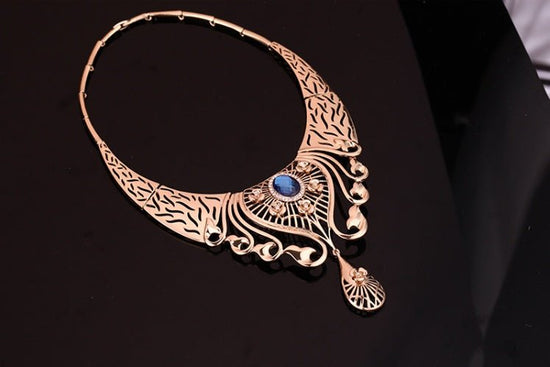 Necklace, earrings, bracelet, ring set $39.11 Dana Fashion Color: Blue Women's Accessories Style: European and American Material: Alloy Processing technology: diamond High-end necklace, earrings, bracelet, ring set, ladies party, alloy, four-piece jewelry