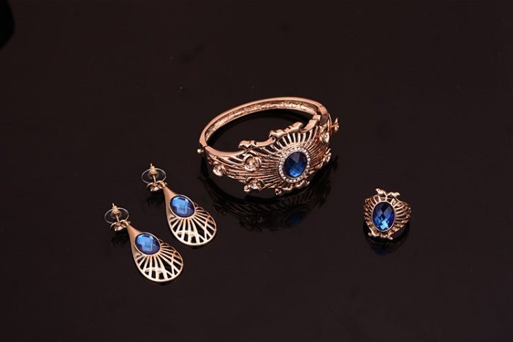 Necklace, earrings, bracelet, ring set $39.11 Dana Fashion Color: Blue Women's Accessories Style: European and American Material: Alloy Processing technology: diamond High-end necklace, earrings, bracelet, ring set, ladies party, alloy, four-piece jewelry