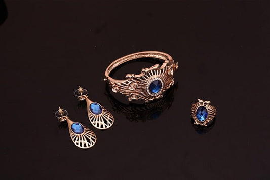 Necklace, earrings, bracelet, ring set $39.11 Dana Fashion Color: Blue Women's Accessories Style: European and American Material: Alloy Processing technology: diamond High-end necklace, earrings, bracelet, ring set, ladies party, alloy, four-piece jewelry