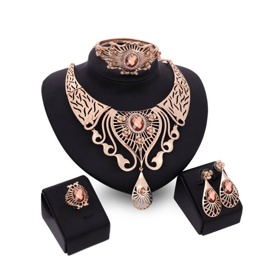 Necklace, earrings, bracelet, ring set $39.11 Dana Fashion Color: Brown Women's Accessories Style: European and American Material: Alloy Processing technology: diamond High-end necklace, earrings, bracelet, ring set, ladies party, alloy, four-piece jewelr