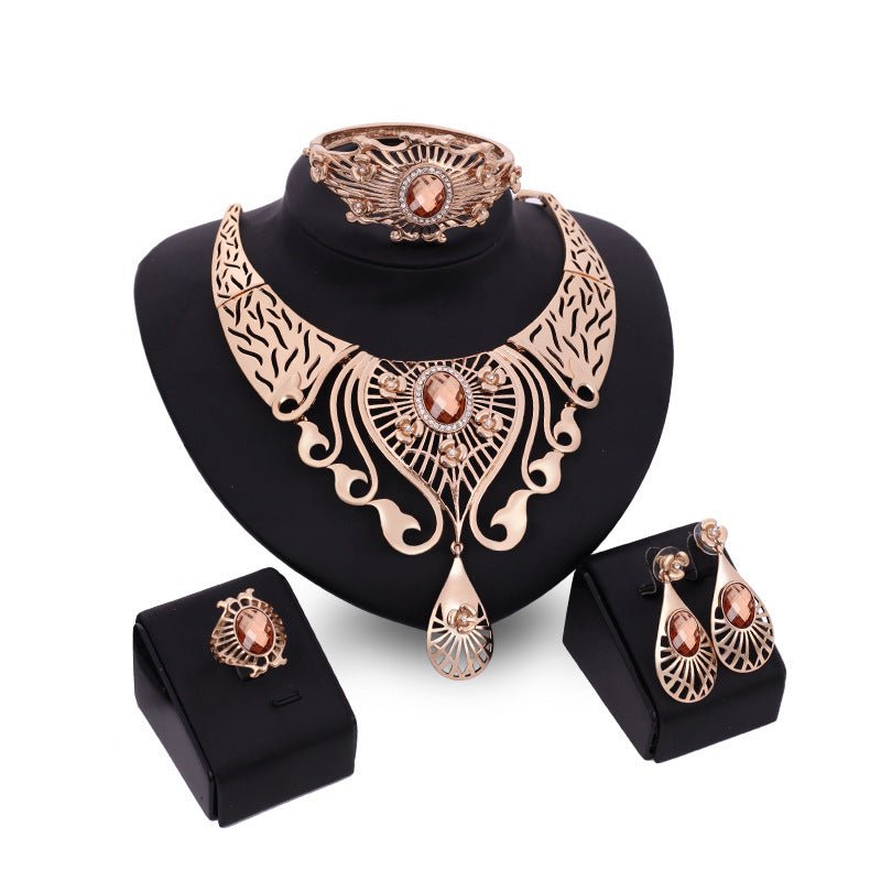 Necklace, earrings, bracelet, ring set $39.11 Dana Fashion Color: Brown Women's Accessories Style: European and American Material: Alloy Processing technology: diamond High-end necklace, earrings, bracelet, ring set, ladies party, alloy, four-piece jewelr