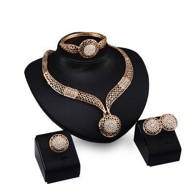 Necklace earrings ring jewelry four piece set $29.00 Dana Fashion Color: Gold Women's Accessories Process: Diamond Set combination: earrings + items + hand accessories Occasions for gifts: employee benefits, weddings, travel memorials Setting material: al
