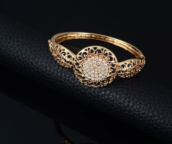 Necklace earrings ring jewelry four piece set $29.00 Dana Fashion Color: Gold Women's Accessories Process: Diamond Set combination: earrings + items + hand accessories Occasions for gifts: employee benefits, weddings, travel memorials Setting material: al