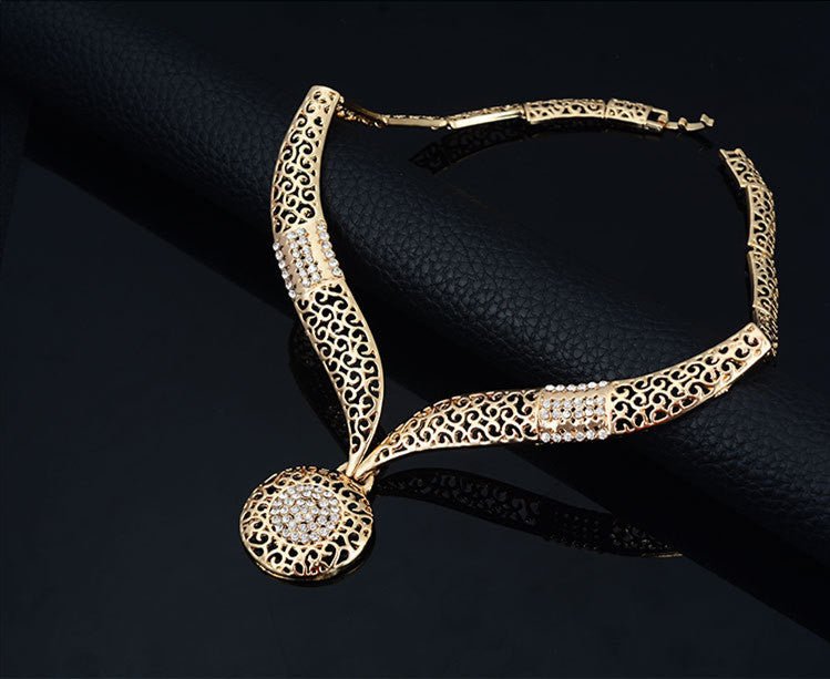 Necklace earrings ring jewelry four piece set $29.00 Dana Fashion Color: Gold Women's Accessories Process: Diamond Set combination: earrings + items + hand accessories Occasions for gifts: employee benefits, weddings, travel memorials Setting material: al