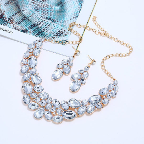 Necklace Set Necklace Earrings Jewelry Two Piece Set $19.99 Dana Fashion Color: Transparent Women's Accessories Product Information： Material: Alloy Treatment process: diamond Style: Women's Set Combination: Earrings + Necklaces Mosaic material: alloy inl